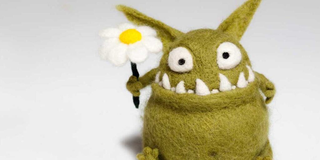 paura del dentista - mostro peluche con fiore